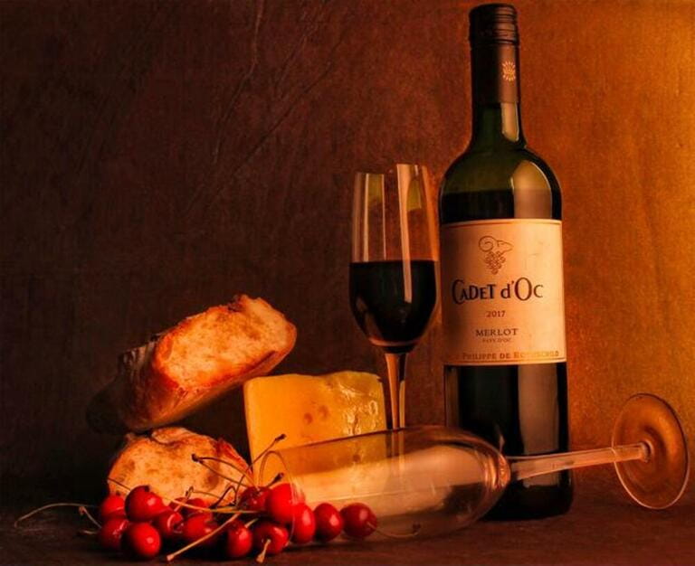 Studio shot of red wine bottle and glass, Mumbai, India Studio shot of red wine bottle and glass, Mumbai, India